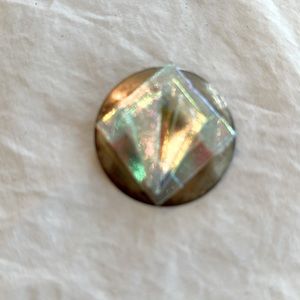 Multicolor stone on sterling pendant. Can be placed on chain or used as broach.